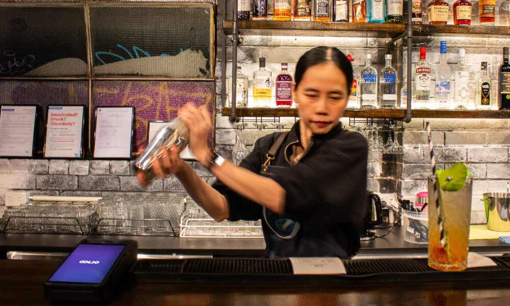 Bar staff with a cocktail shaker