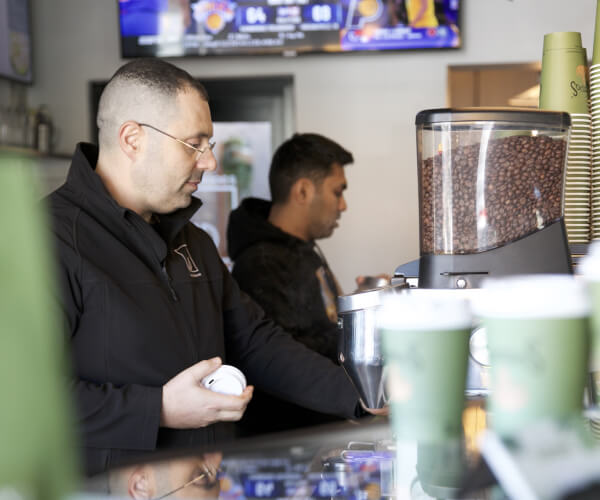 Making coffees in a busy cafe