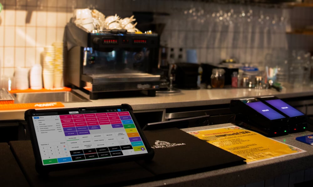 POS and payment terminals on the bar at a pizzeria