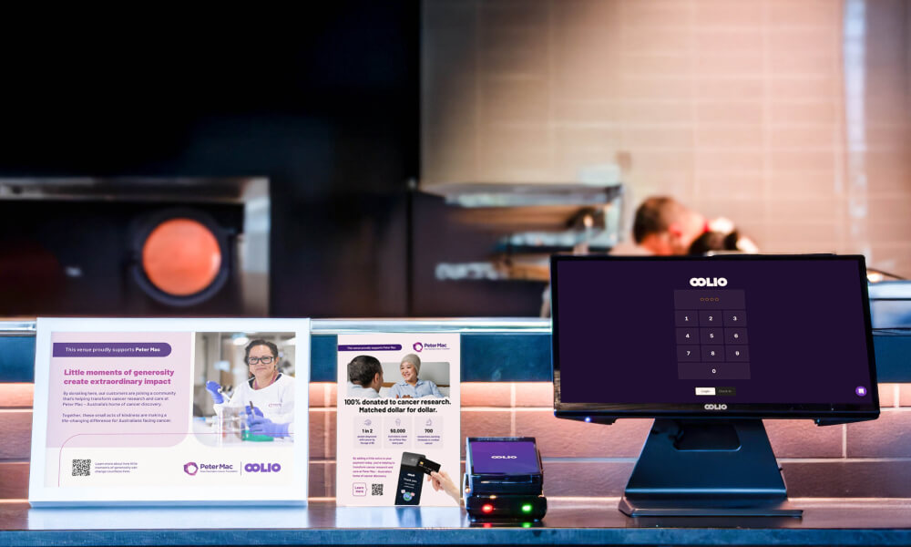 POS at counter with Oolio Giving and Peter Mac Certificate