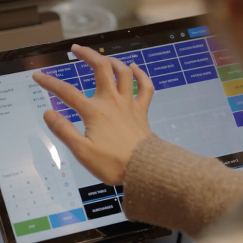 Close up of Oolio POS in a cafe