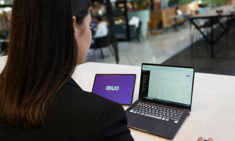 Manager using laptop in venue