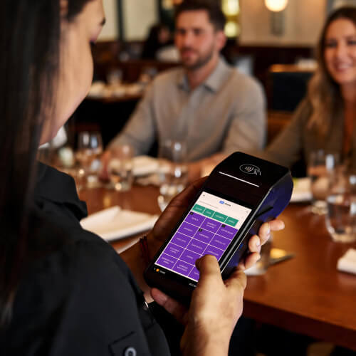 Staff putting and order through on mobile POS