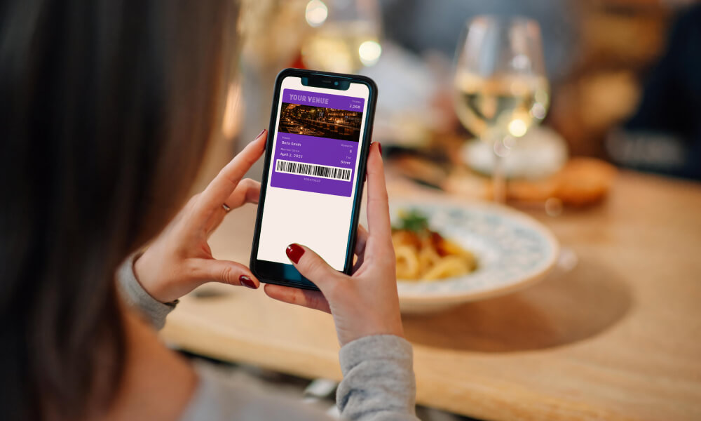Customer using Oolio Loyalty app in venue